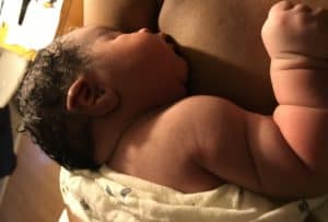 newborn baby Wynter being breastfed