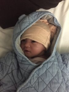 baby Evelyn wrapped in a comfy blanket